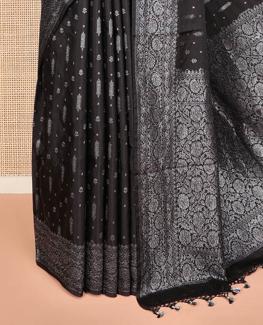 Black Fancy Georgette Saree Decorated with Zari Buttas, Zari Woven Border of Floral Creeper Designs, Zari-Decked Up Pallu of Floral Jaal Designs, and Paired with a Matching Blouse