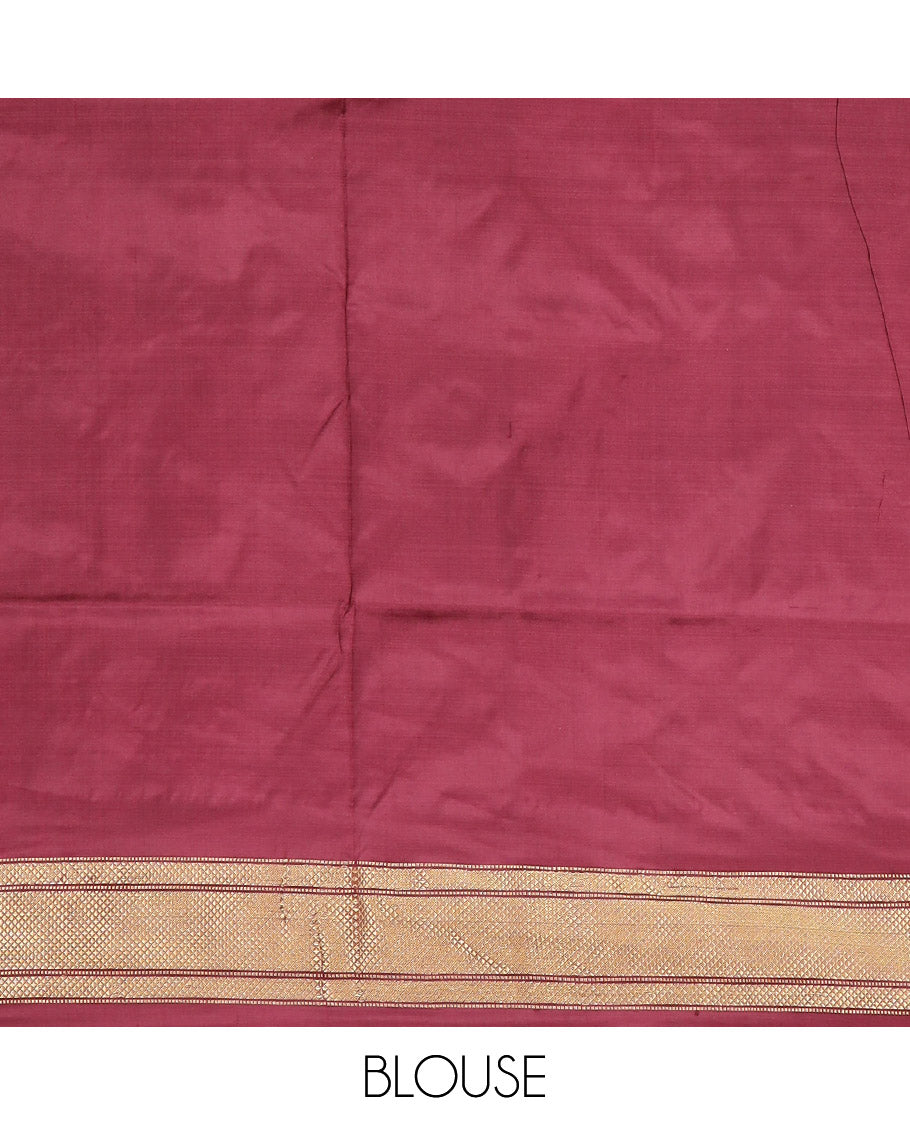 Maroon Ikkat Silk Saree with Colourful Elephant and Free-Style Ikkat Buttas, a Subtly Woven Zari Border, a Vibrantly Woven Pallu of Ikkat Patterns, and a Plain Blouse
