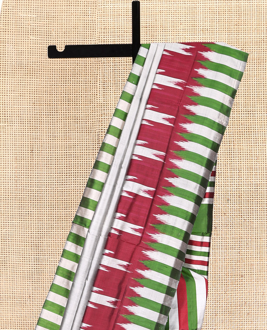 Grey Plain Pochampally Ikat Silk Saree, Complemented by a Contrast Ikat-Style Temple Border, Striped Pallu, and No Blouse