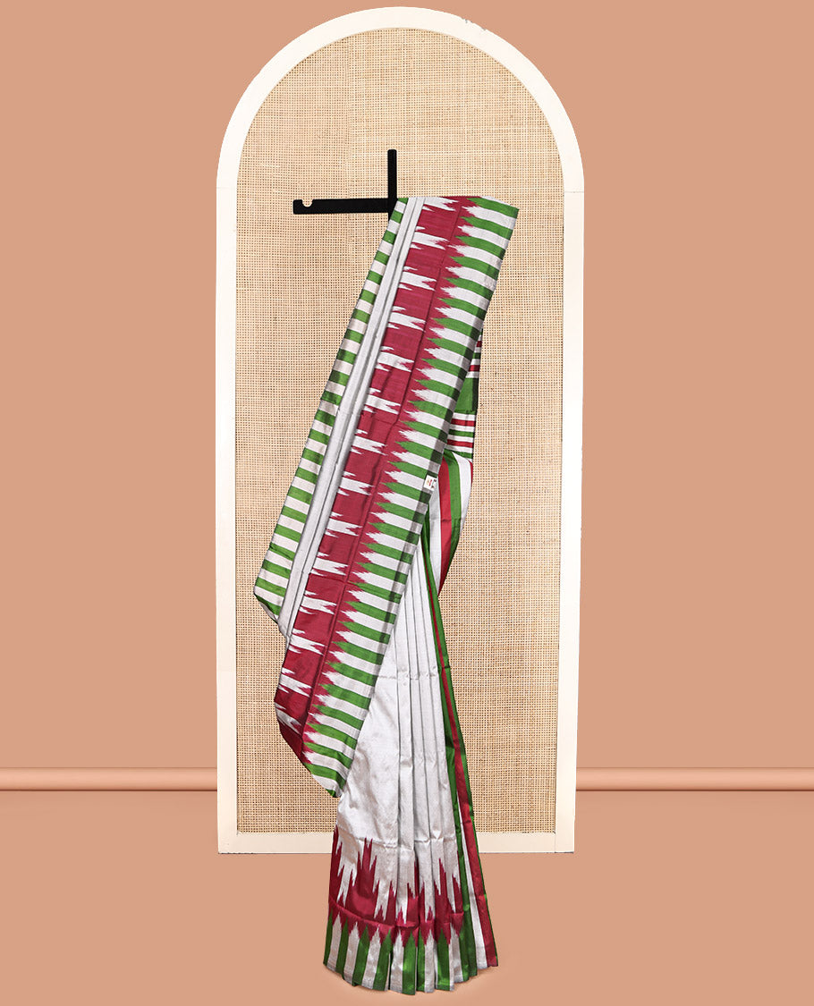 Grey Plain Pochampally Ikat Silk Saree, Complemented by a Contrast Ikat-Style Temple Border, Striped Pallu, and No Blouse