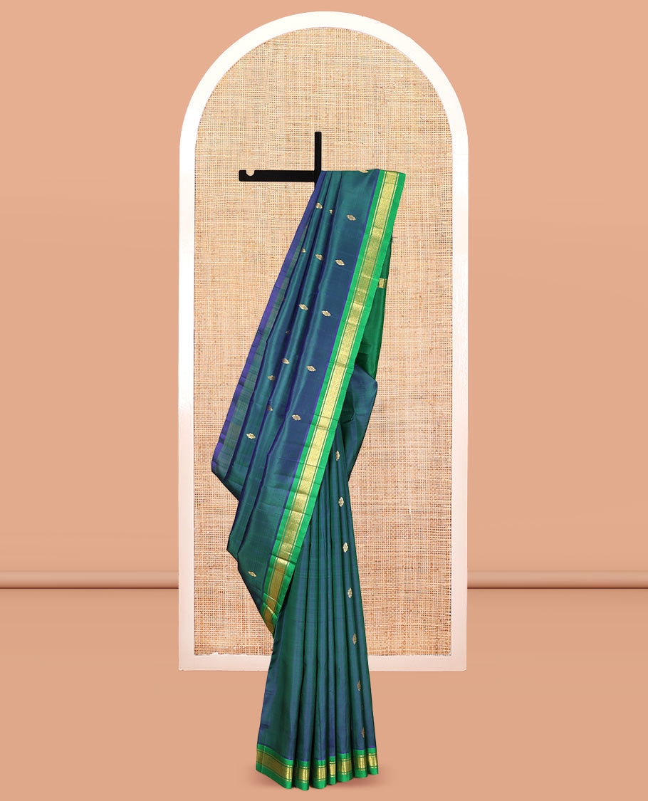 Blue Kanchipuram Silk Saree Featuring Zari Buttas, Complemented by a Contrast One-Sided Border of Banaras, and Jaal Design, Zari Design Pallu, and a No Blouse