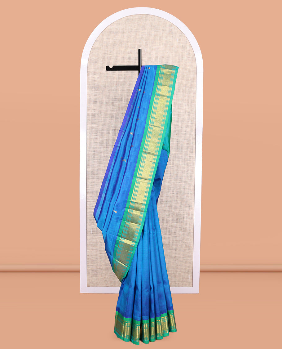 Blue Kanchipuram Silk Saree, Woven with Zari Buttas, a Contrast One-Sided Border of Rekku, Banaras, Muthu, and Mayil Kann Designs, Zari Design Pallu, and No Blouse