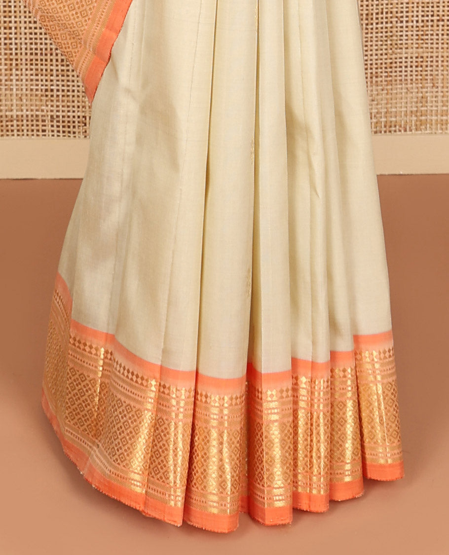 Beige buttas kancheepuram silk saree with contrast border of thilakam, mokku, banaras, kuyil kann design border & zari design pallu