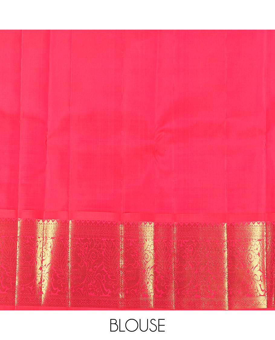 Green mayil chakram buttas Kanchipuram silk saree, contrast border of thilakam mokku, cross kamalam, and mayil designs, and zari design pallu