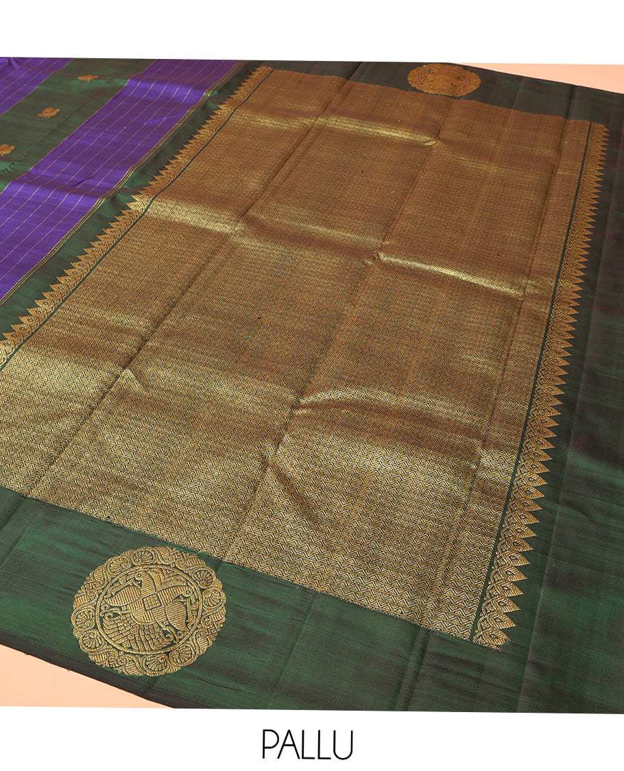 Blue and Green Striped Kanchipuram Silk Saree, Beautifully Bedecked with Muthu Stripes, Mayil, and Round Iruthaipakshi Motifs All Over Its Body, Grand Pallu of Triangle Motifs, and Paired with a Contrast Blouse