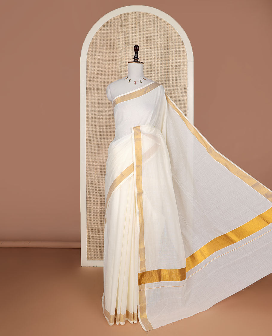 Cream plain design Kerala saree, zari border, and zari pallu