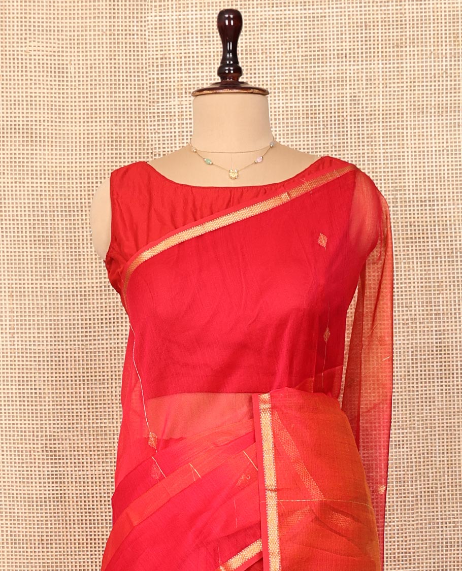 Red Maheshwari Cotton Saree, Uniquely Detailed with Diamond Buttas on Its Body, Highlighted by Piping Zari Design Border, Gleaming Pallu of Zari Stripes, and Paired with a Matching Blouse