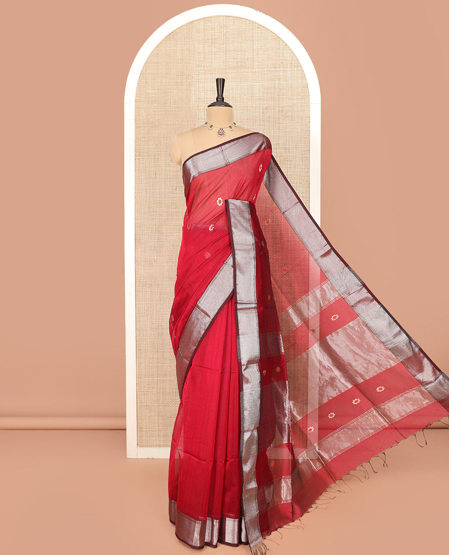 Red Maheshwari Cotton Saree Bedecked with Floral Zari Buttas, Graced with Contrast Chevron Striped Zari Border, Pallu Elevated with Zari Stripes, and Paired with a Matching Blouse