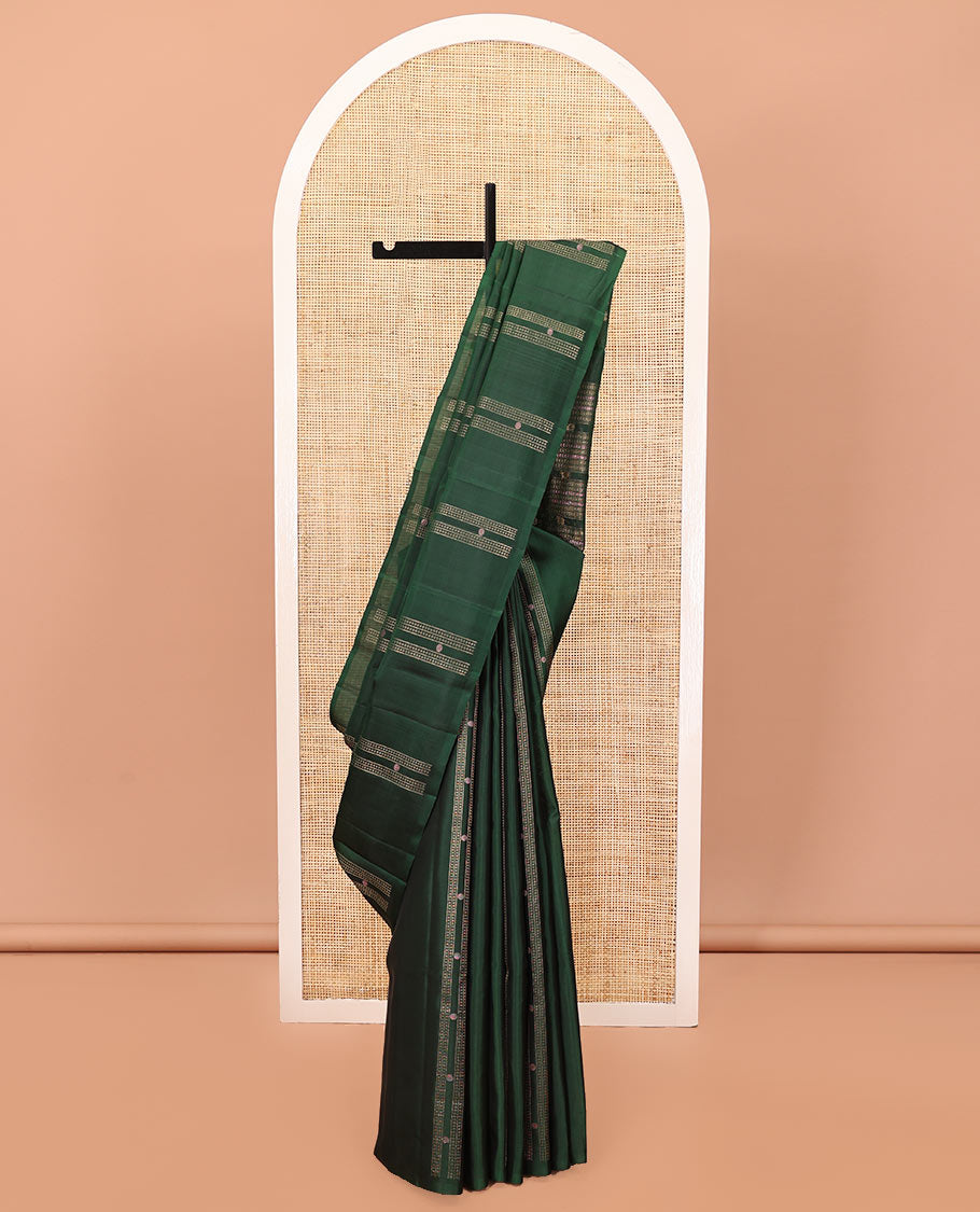 Borderless Green Mayuri Soft Silk Saree, Embellished with Stripes, Diamonds, and Poun Buttas All Over Its Body, Highlighted by a Geometric Design Pallu, and Paired with a Matching Blouse