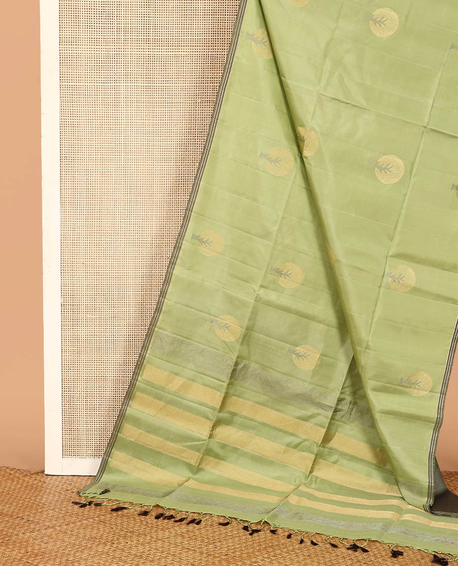 Green tree motifs zari woven soft silk saree, striped piping border, and pallu of zari designs