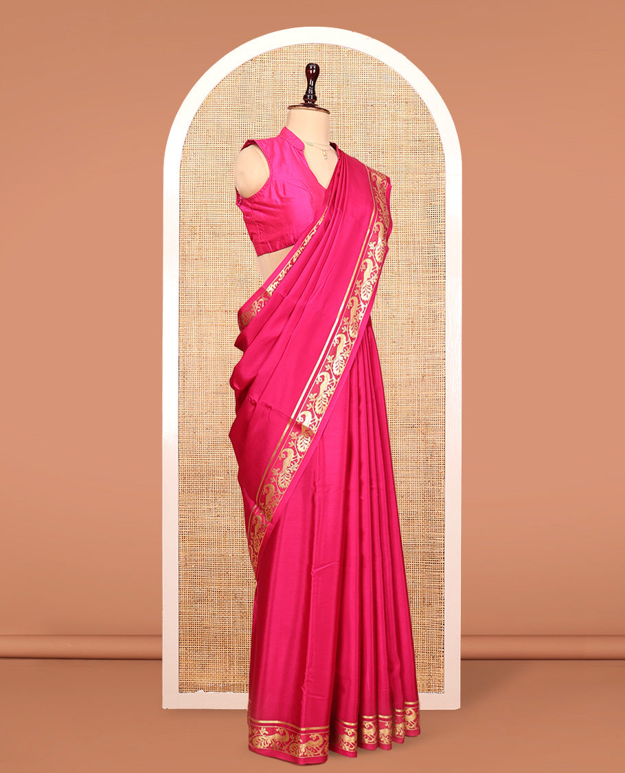 Pink Plain Mysore Silk Saree, Highlighted by a Traditional Zari Border of Peacock Designs, Pallu Steeped with Zari Stripes, and Paired with a Matching Blouse
