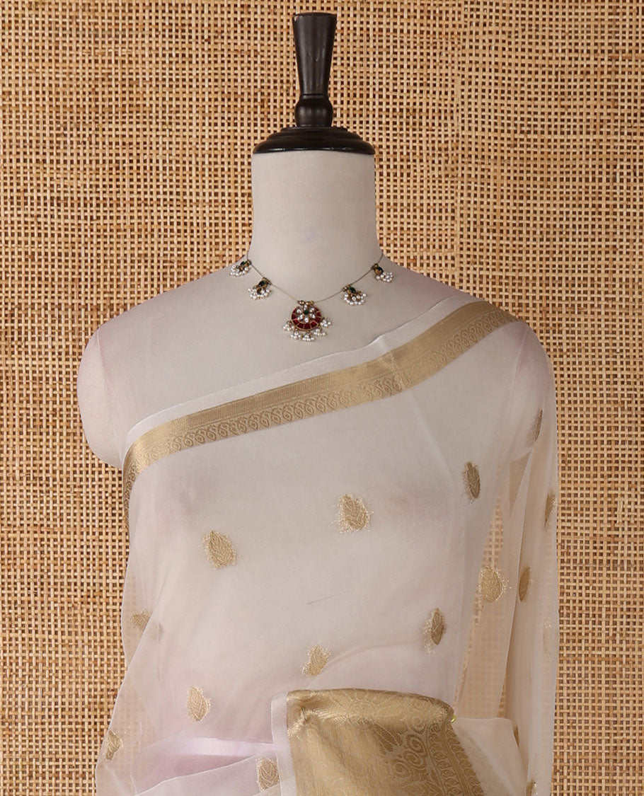 White semi-organza saree with zari buttas, zari border of temple & floral creeper designs, zari design pallu & running blouse