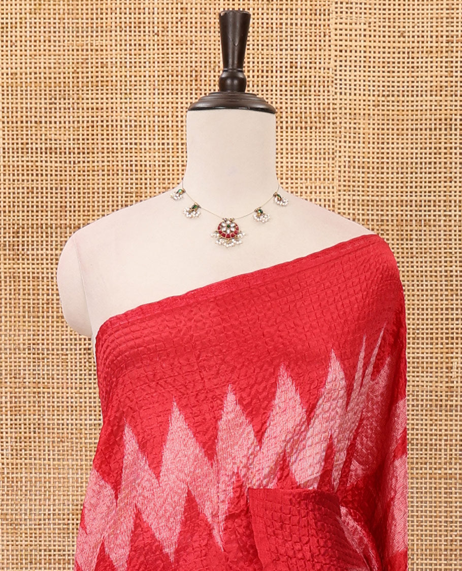 Borderless white 3-layer ikkat chevron printed litchi crushed saree, ikkat printed pallu & small butta printed red blouse