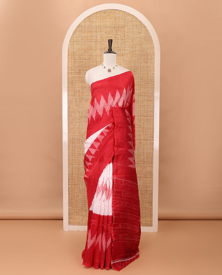 Borderless white 3-layer ikkat chevron printed litchi crushed saree, ikkat printed pallu & small butta printed red blouse