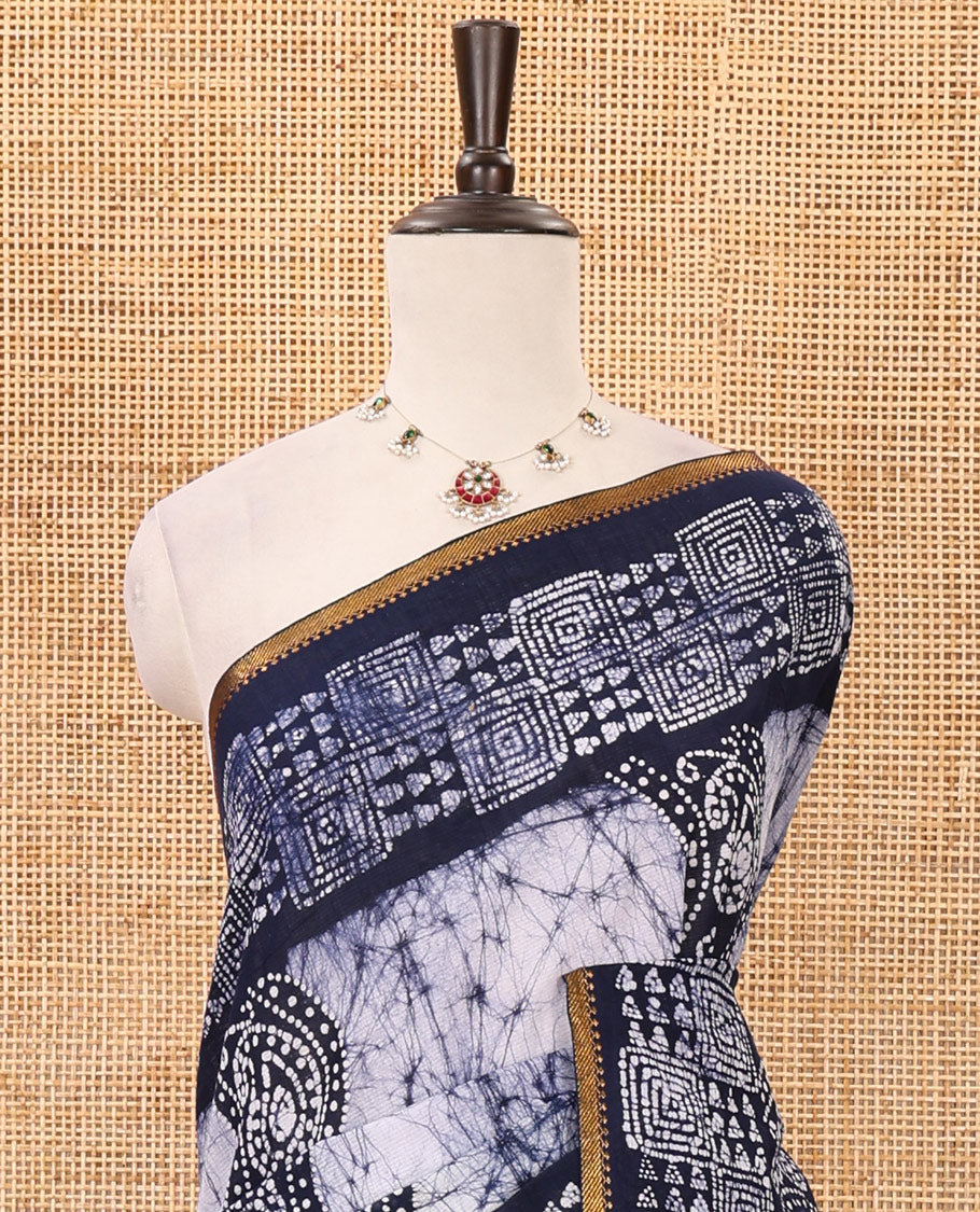 Navy blue batik-printed sungudi cotton saree, mango zari small border, batik-printed pallu & running blouse