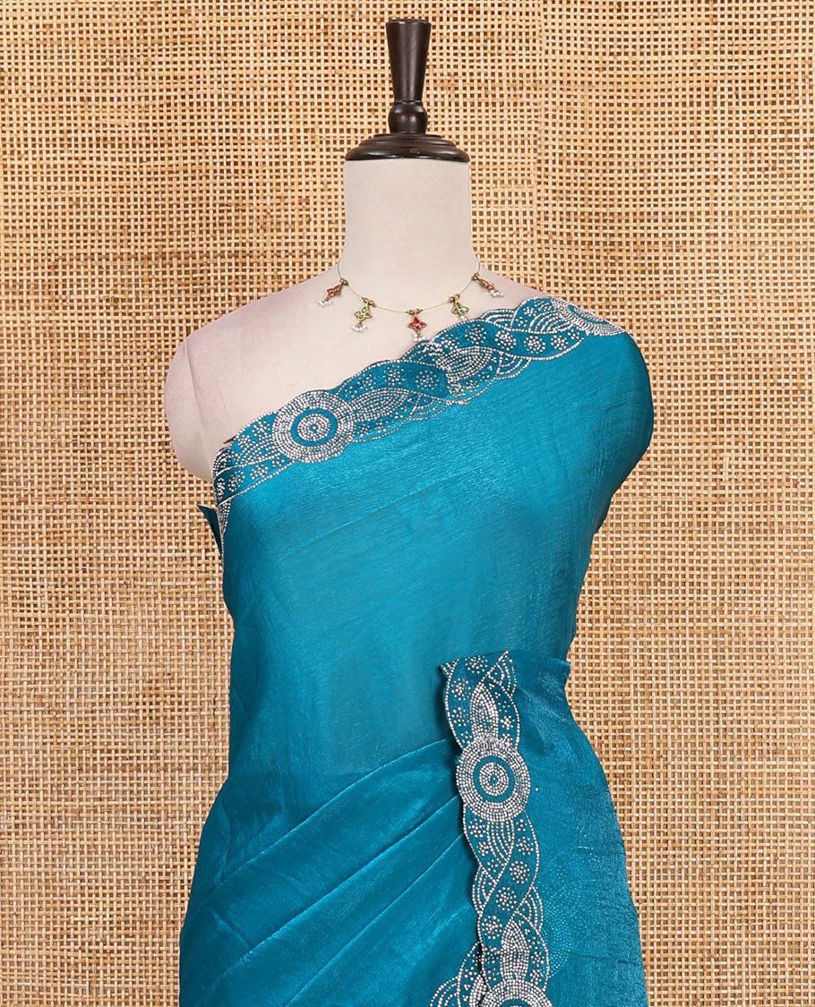 Rama green full-plain fendy chiffon saree, scallop swarovski stone work geometric border and contrast plain blouse
