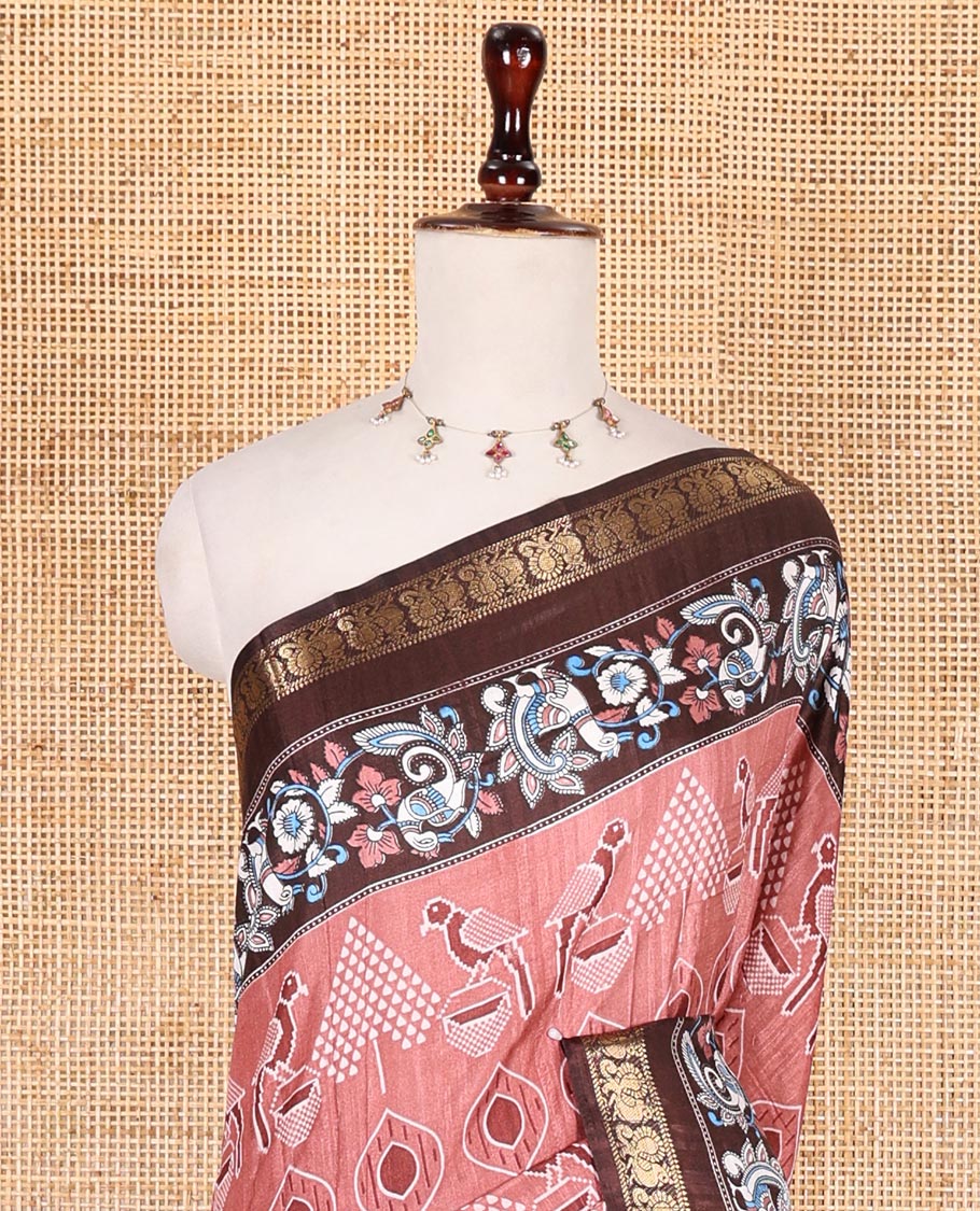 Peach pochampally ikkat parrot motifs printed dola silk saree, contrast border of kalamkari printed with zari work, kalamkari peacock printed pallu, and contrast zari design blouse