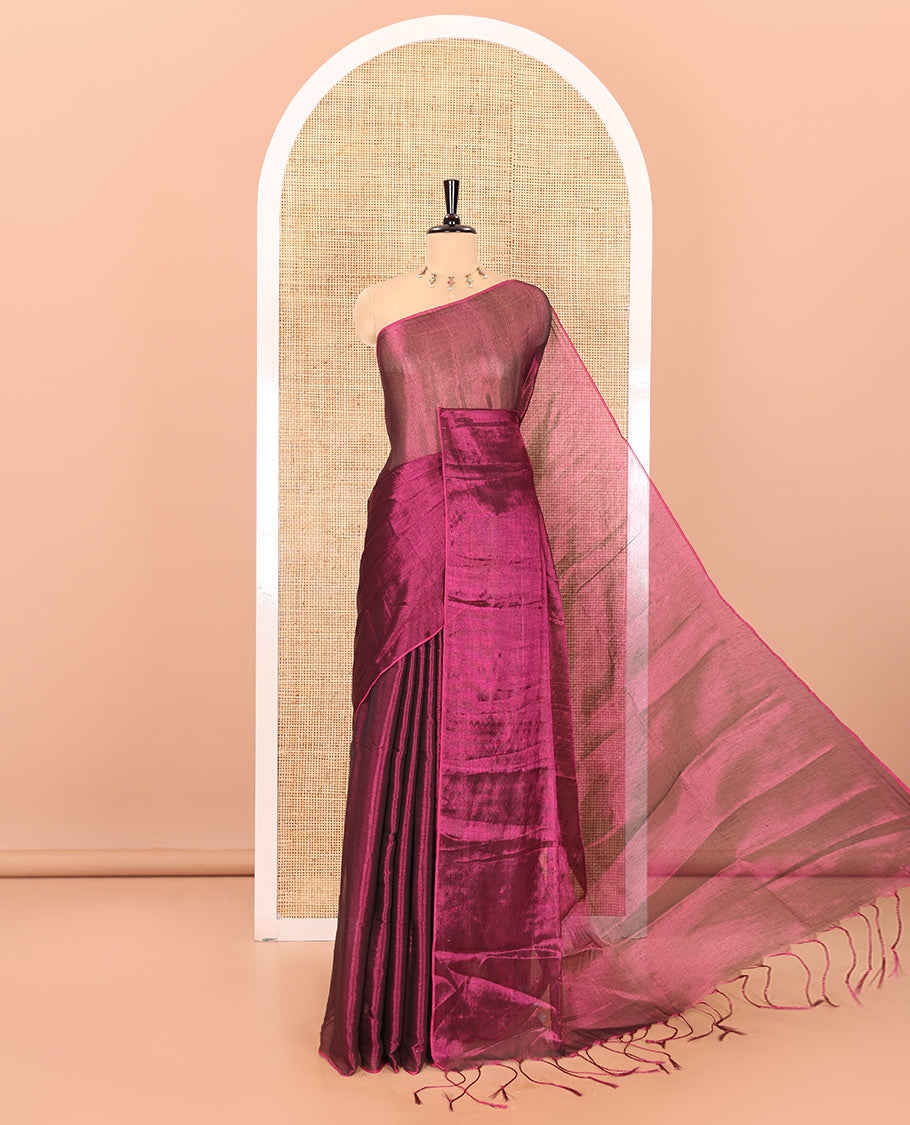 Borderless magenta plain khadi tissue saree self pallu with tassels and a matching blouse