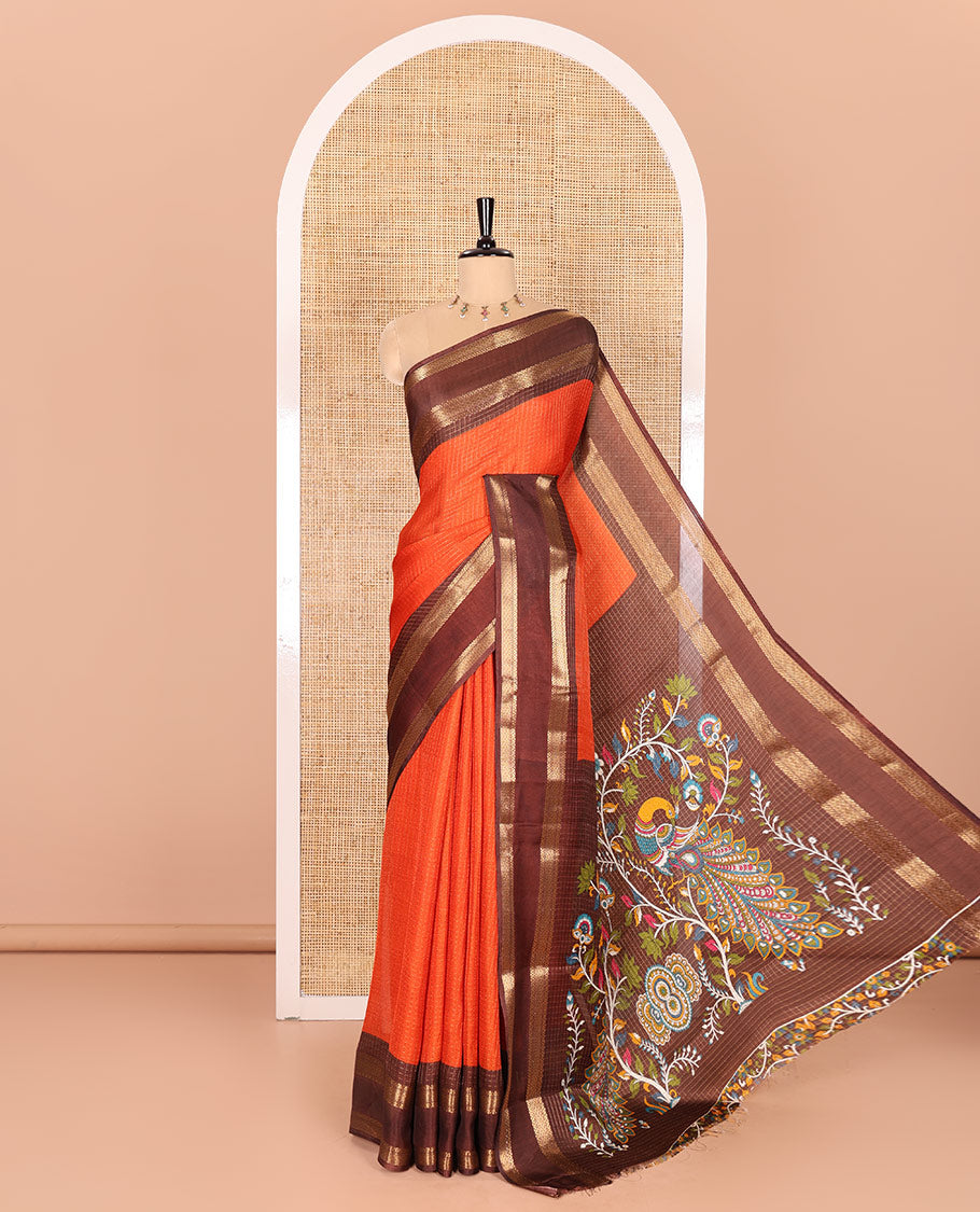 Rust Orange Zari Checked Moss Chiffon Saree Highlighted with a Contrast Rettai Pettu Traditional Zari Border, Colorfully Kalamkari Peacock Printed Pallu, and a Contrast Kalamkari Printed Blouse
