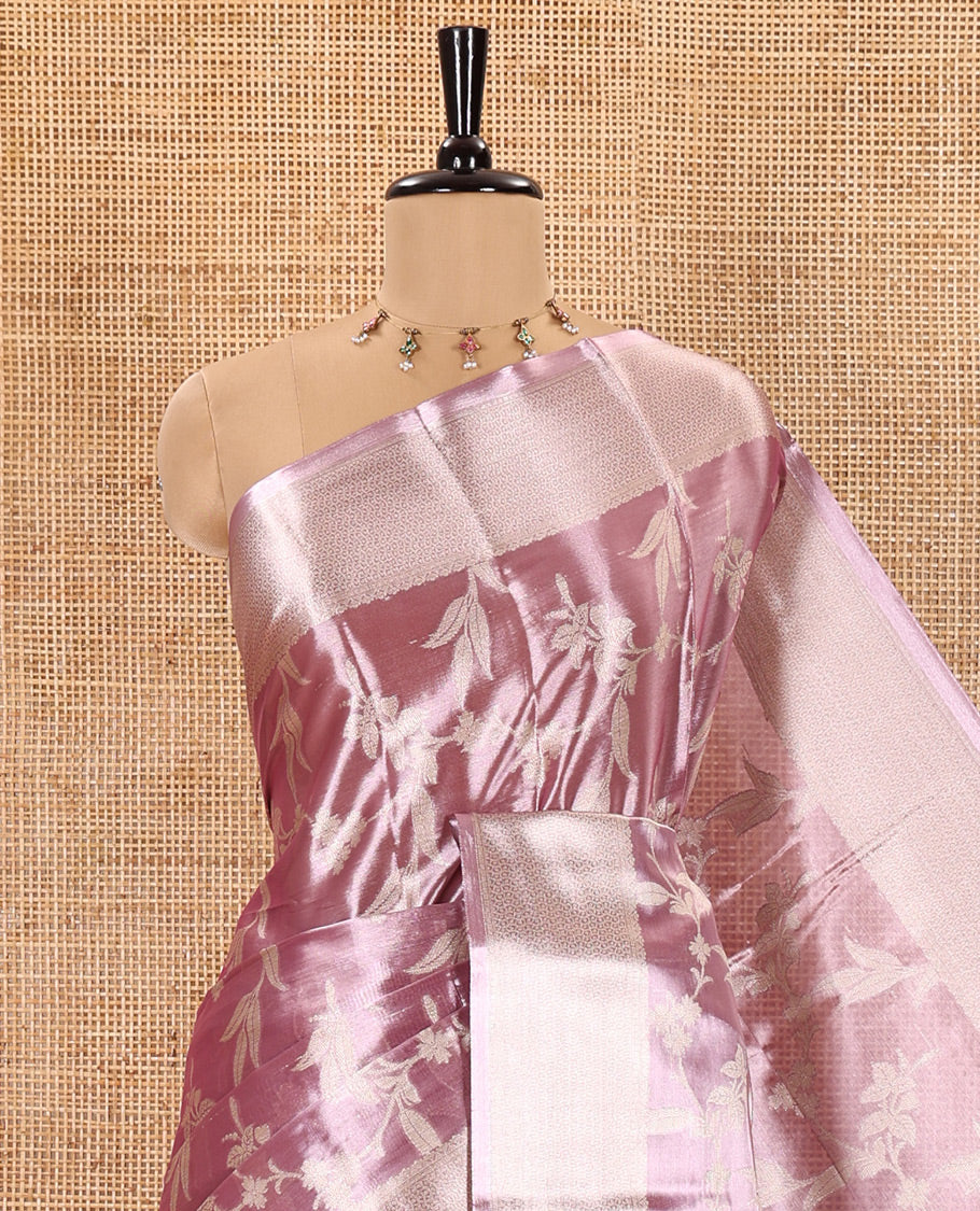 Lavender Tissue Silk Saree Adorned with Floral Vine Brocade in Rose Copper Zari, Featuring a Traditional Zari Design Border, Pallu Steeped with Floral Motifs, and Paired with a Matching Floral Brocade Blouse