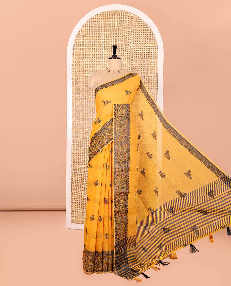Yellow Chanderi Cotton Saree Delicately Woven with Warli Motifs All Over Its Body, Featuring a Subtly Sparkled Border Depicting Warli Village Motifs, Subtly Striped Pallu, and Paired with a Matching Blouse