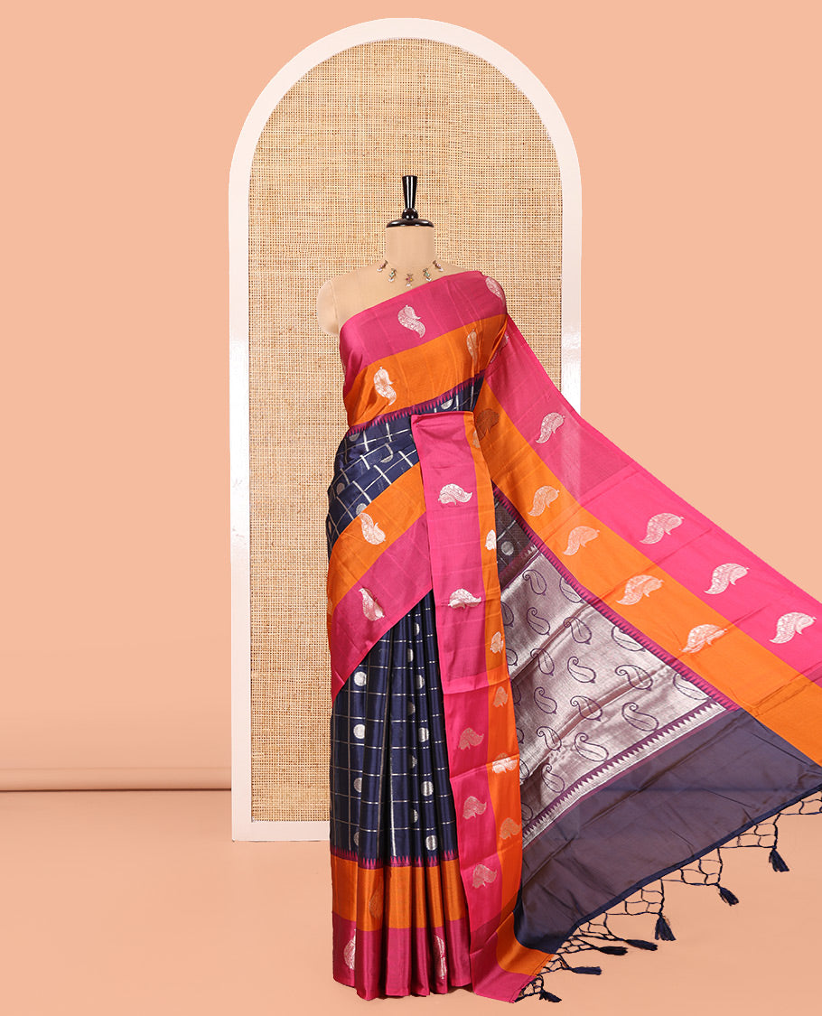 Blue Warm Silk Saree, Gracefully Embellished with Zari Buttas Enclosed Checks on Its Body, Complemented by a Contrast Border of Unique Designs, Pallu of Paisleys, and Paired with a Matching Blouse