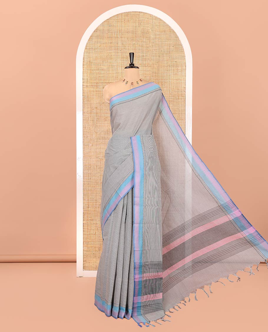 Grey Chettinad Cotton Saree, Sparsely Designed with Stripes on Its Body, Complemented by Contrast Traditional Design Border, Striped Pallu, and Paired with a Matching Blouse