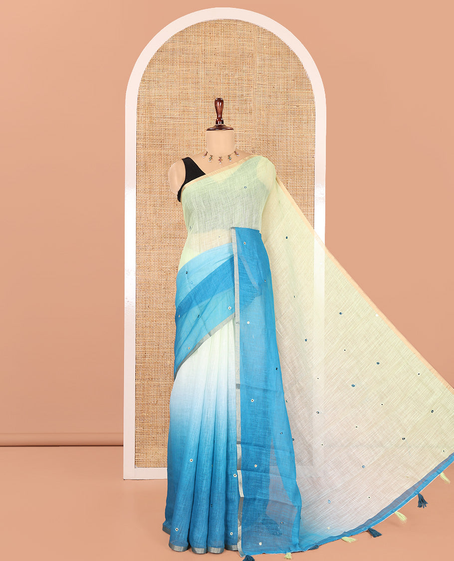 Blue Linen Cotton Saree Features Ombre-Style Dyed and Mirrorwork, a Subtle Piping Border, and a Matching Blouse