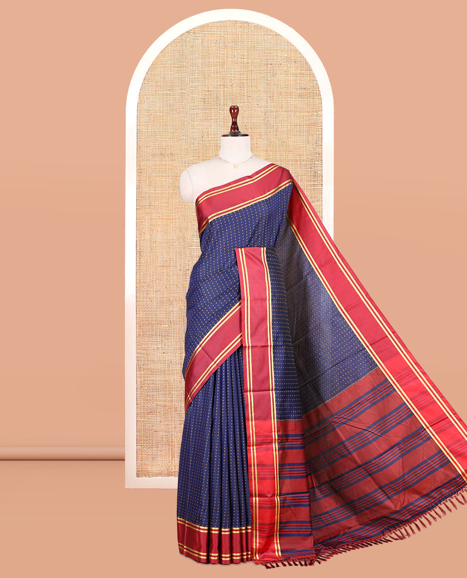 Navy Semi-Soft Silk Saree Steeped with Plus-Shaped Buttas, Contrast Border, and a Matching Blouse