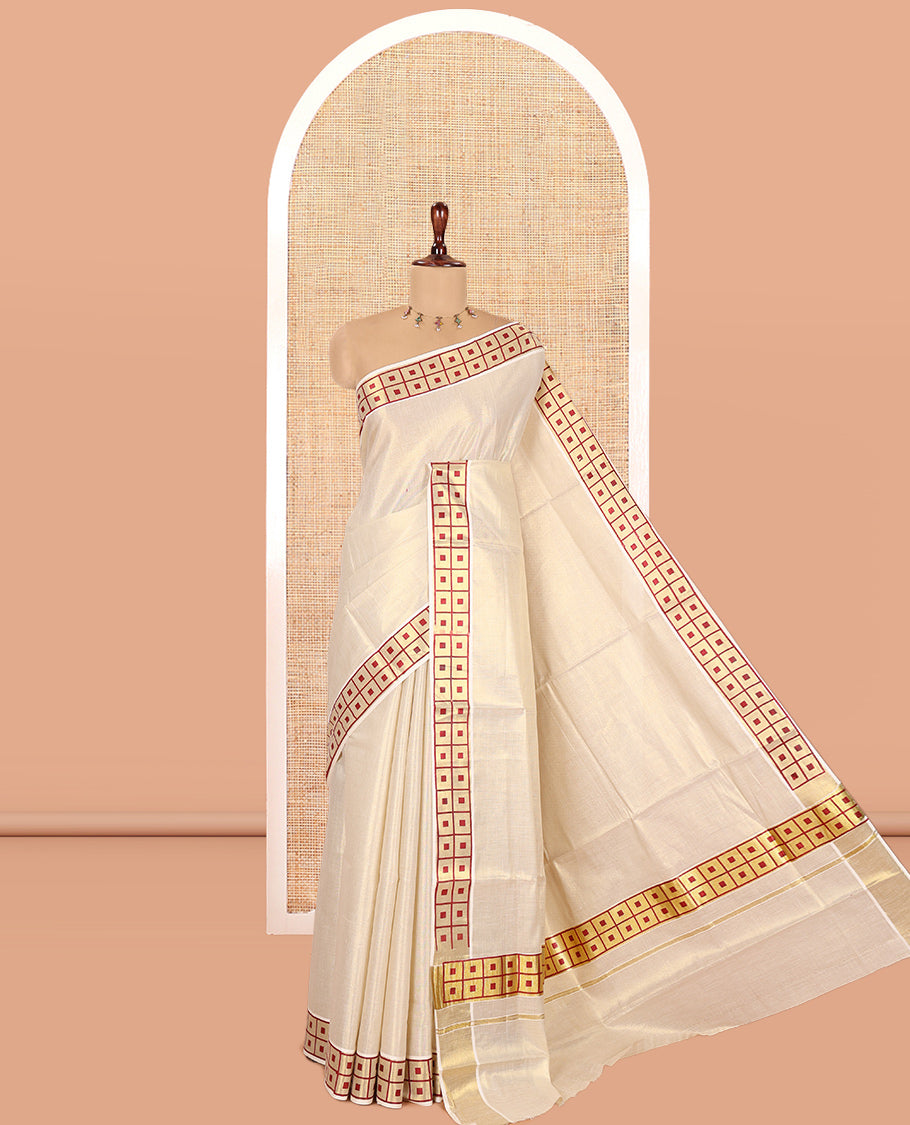 Gold-Maroon Plain Kerala Tissue Saree Features a Butta Enclosed Checked Border, and a Matching Blouse