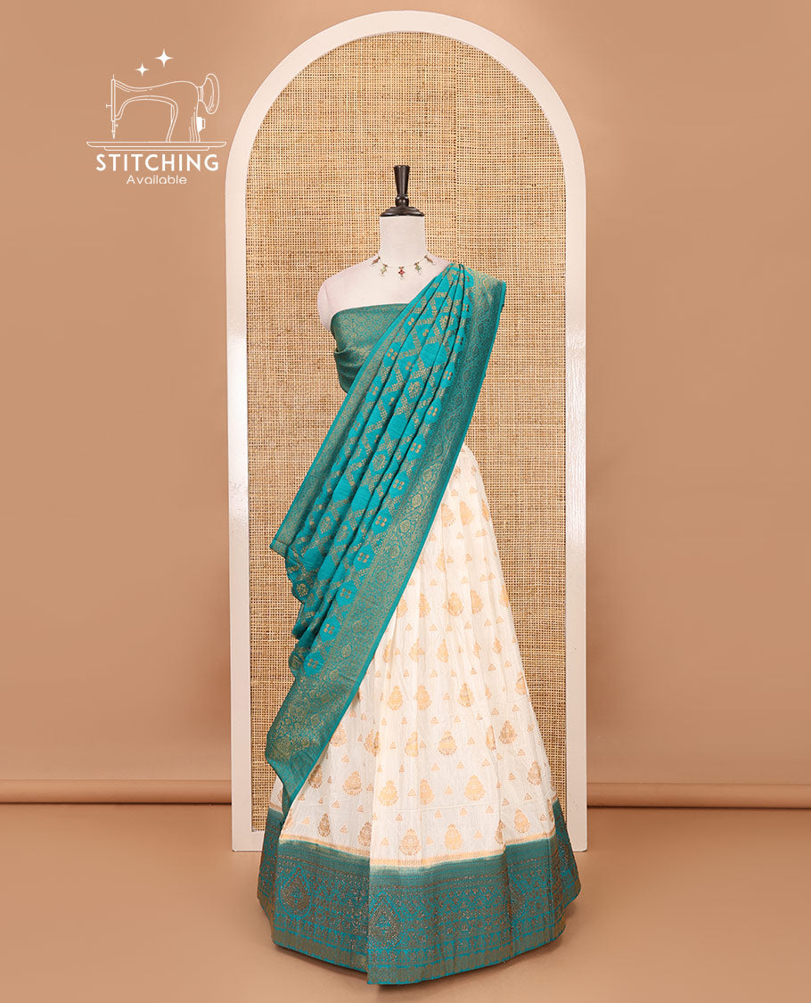 Cream georgette crepe halfsaree,zari buttas & traditional Swarovski stonework rama-green border skirt, jacquard blouse & banarasi jacquard dhavani