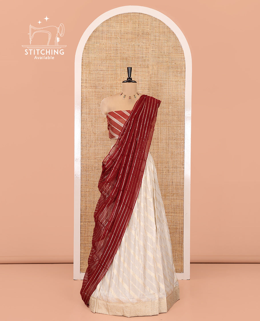 Cream-Maroon Semi-Banarasi Half-Saree Features Leheriya Striped Skirt, Contrast Leheriya Striped Blouse, Georgette Striped Dhavani