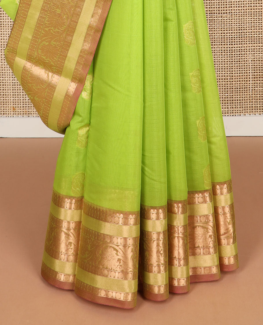 Light green floral motifs silk cotton saree with contrast intricate zari design border & paisley design pallu