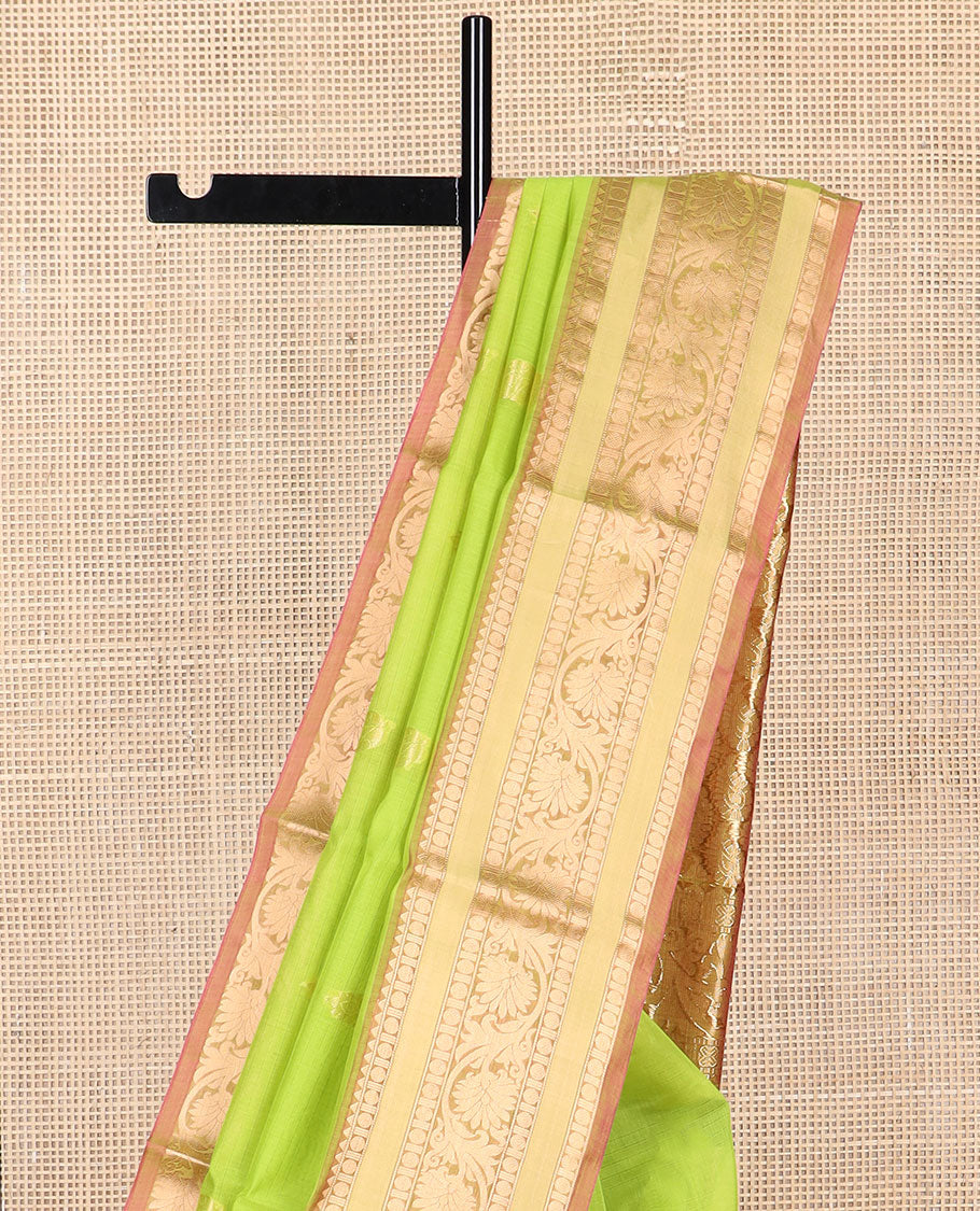 Light green floral motifs silk cotton saree with contrast intricate zari design border & paisley design pallu