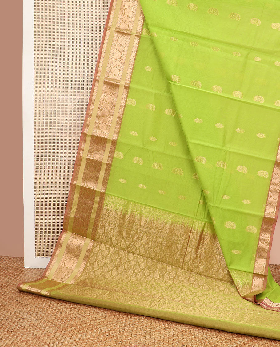 Light green floral motifs silk cotton saree with contrast intricate zari design border & paisley design pallu
