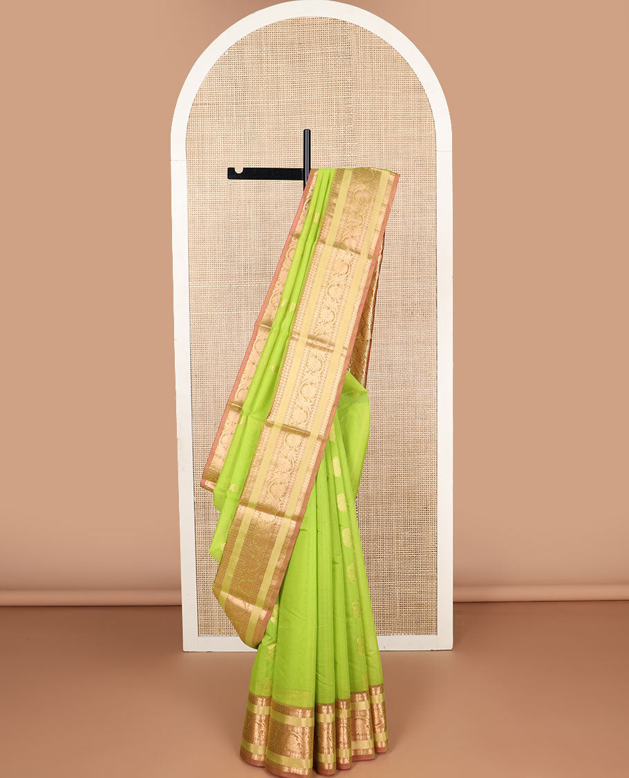 Light green floral motifs silk cotton saree with contrast intricate zari design border & paisley design pallu