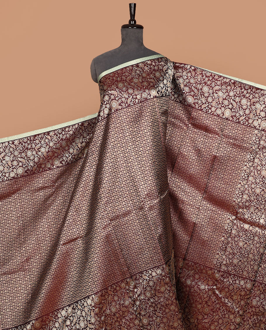 Maroon jacquard silk saree, big zari border & pallu accentuated with floral & bird jaal jacquard zari design