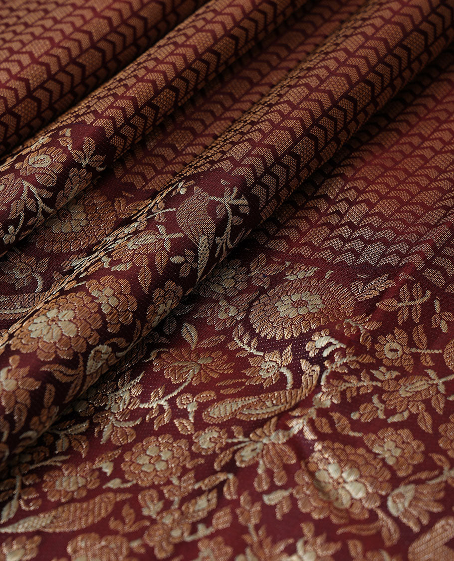 Maroon jacquard silk saree, big zari border & pallu accentuated with floral & bird jaal jacquard zari design