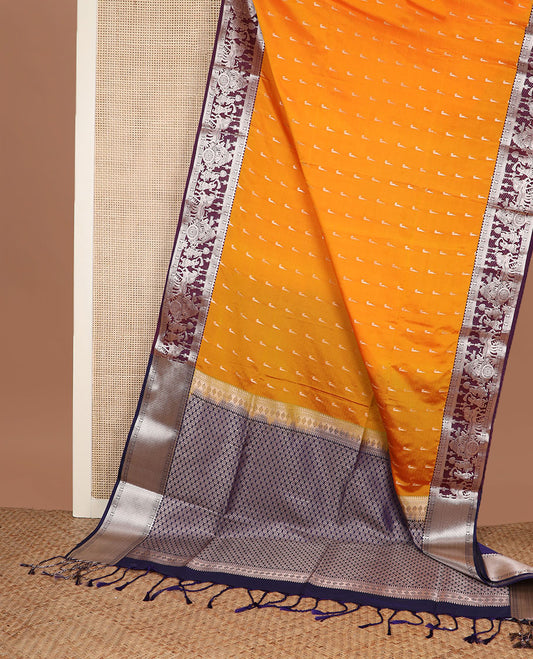 Orange muniya buttas soft silk saree, contrast traditional zari border of wedding-theme designs, and jaal pallu