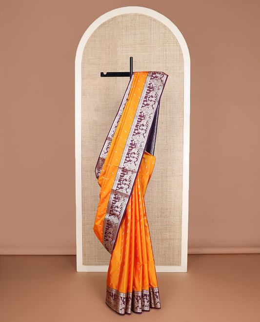 Orange muniya buttas soft silk saree, contrast traditional zari border of wedding-theme designs, and jaal pallu