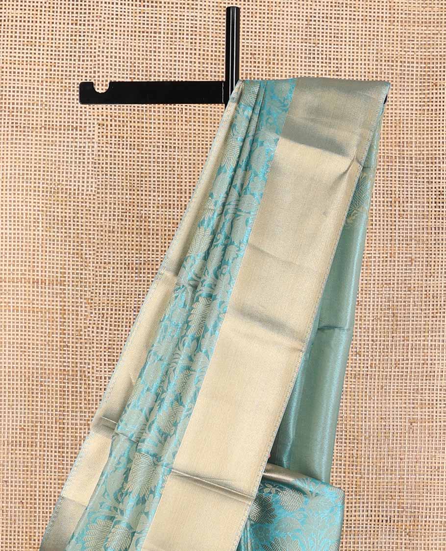 Blue floral jacquard tissue saree with contrast striped border & zari design pallu