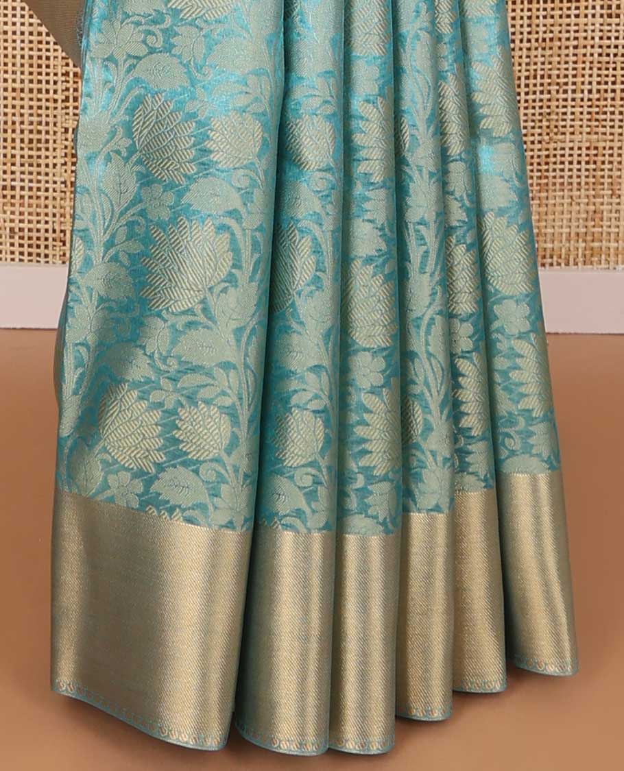 Blue floral jacquard tissue saree with contrast striped border & zari design pallu