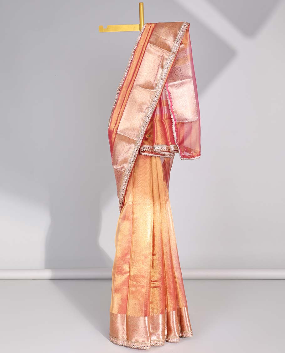 Orange tissue saree with self zari design border & intricate zari design pallu