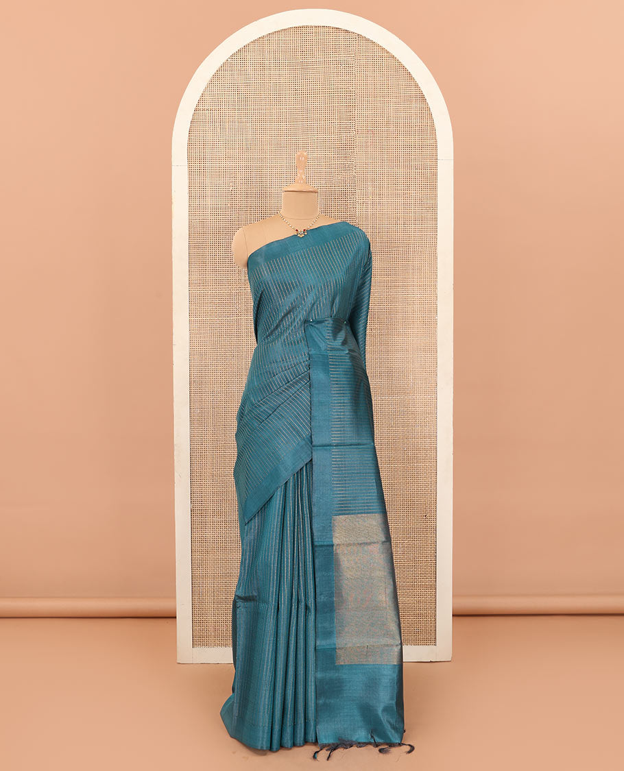 Blue tiny boxed motif stripes tussar silk saree, self-border, and gleaming zari pallu