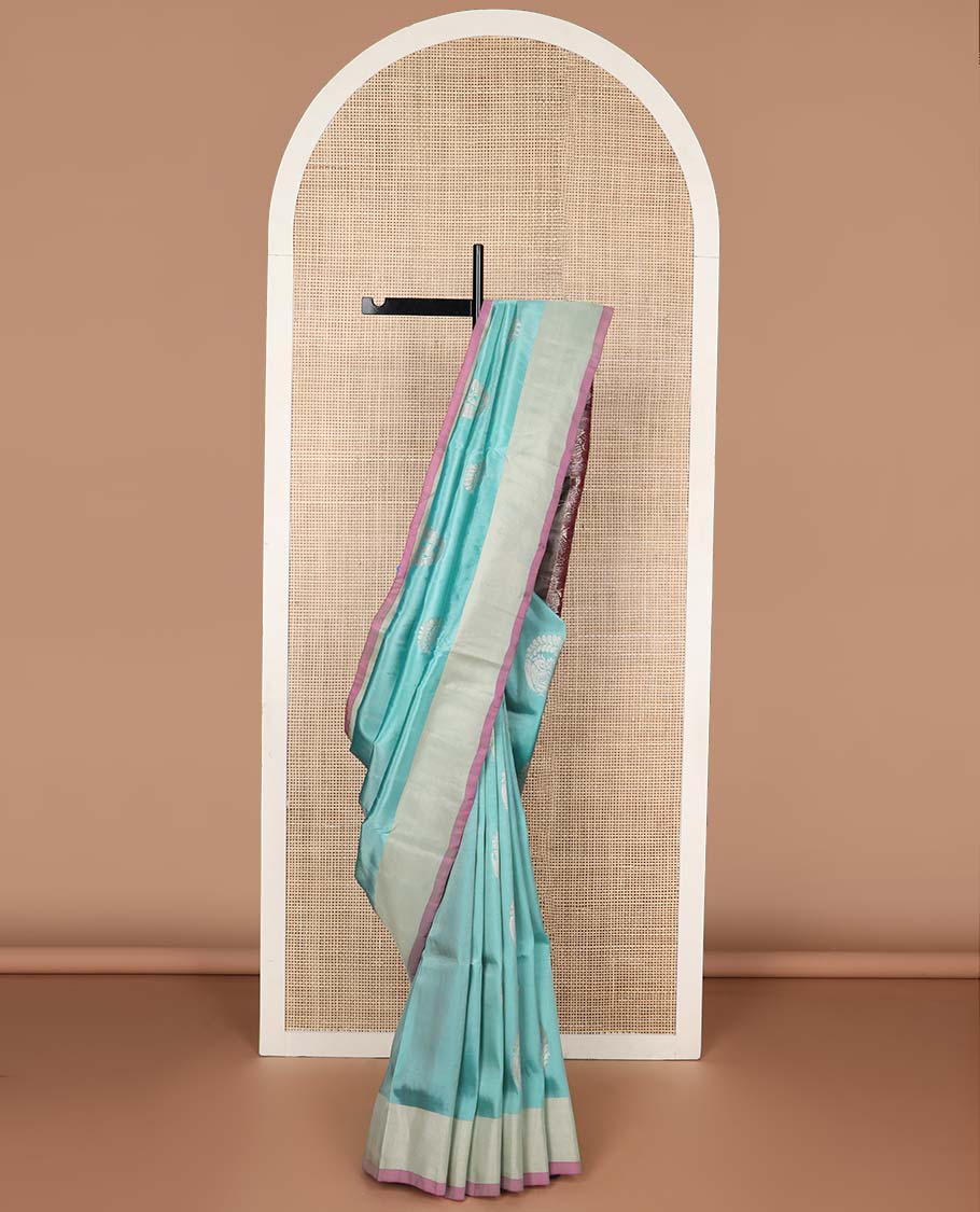 Light blue floral motifs uppada silk saree with contrast zari border & floral design pallu
