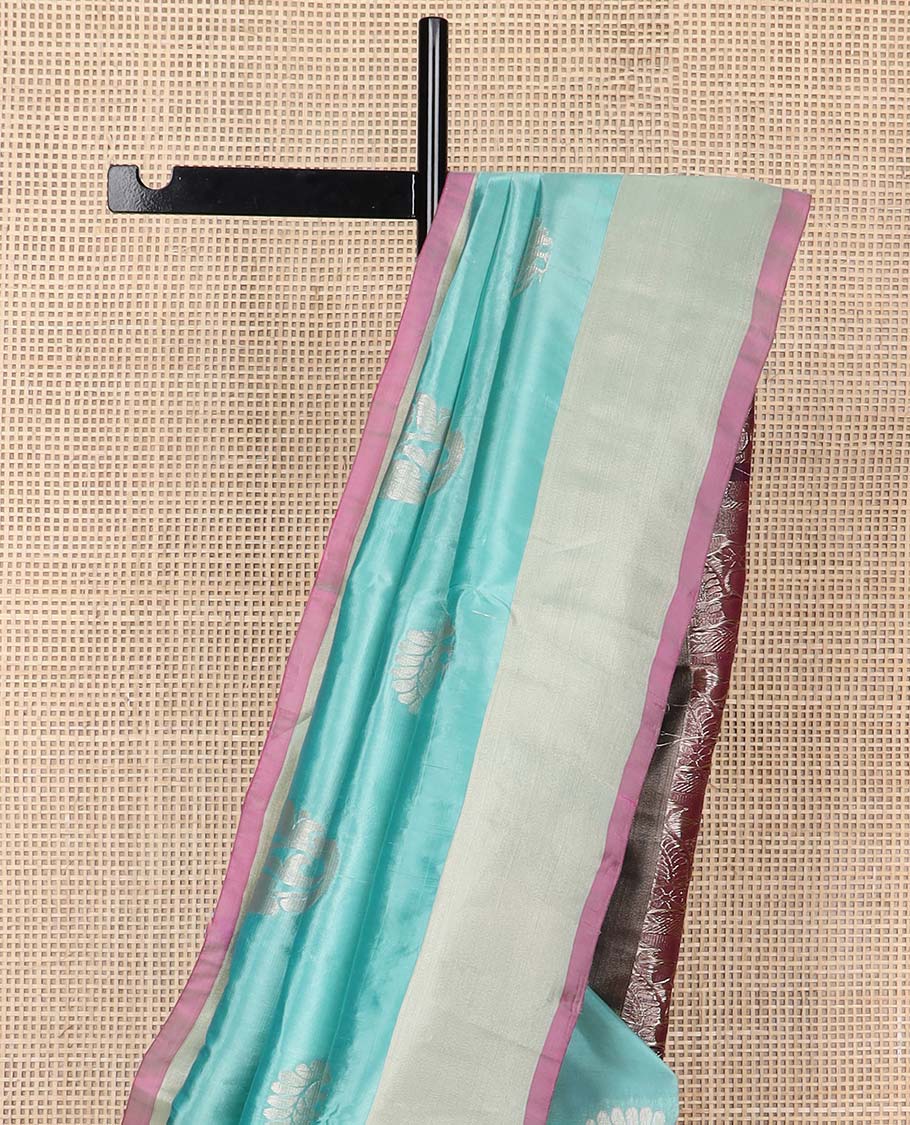 Light blue floral motifs uppada silk saree with contrast zari border & floral design pallu