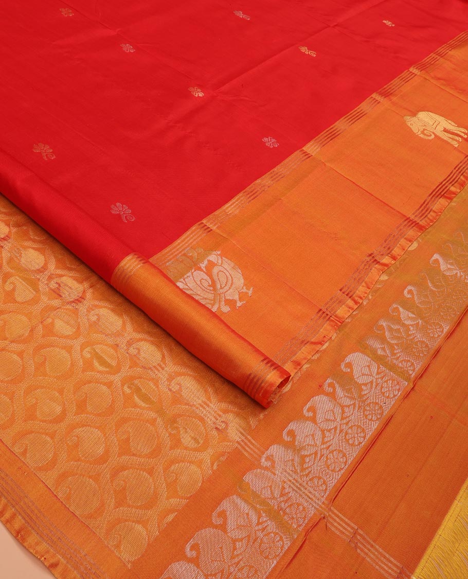 Red Uppada Silk Saree Decorated with Zari Buttas, Captivating Contrast Border Featuring Peacock and Elephant Motifs in Zari, Pallu Adorned with Paisley Butta, Enclosed Jaal Design, and Paired with a Contrast Blouse