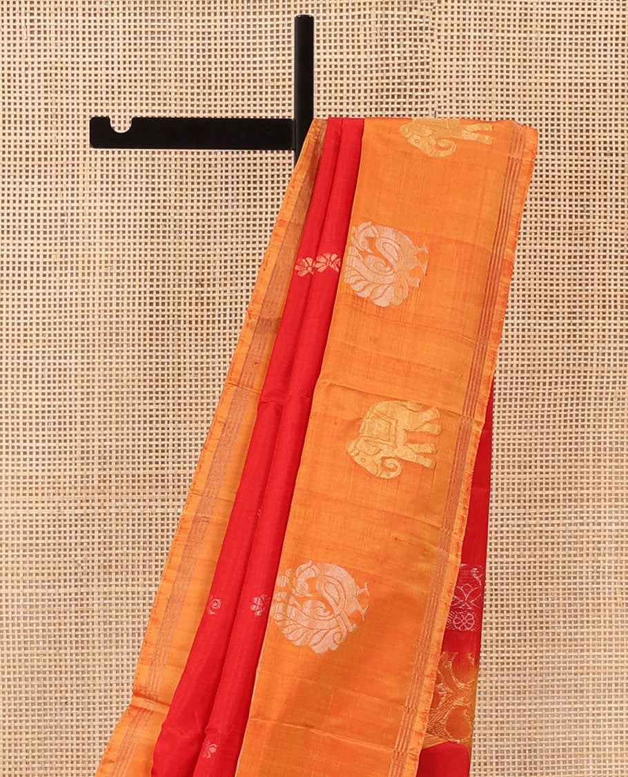 Red Uppada Silk Saree Decorated with Zari Buttas, Captivating Contrast Border Featuring Peacock and Elephant Motifs in Zari, Pallu Adorned with Paisley Butta, Enclosed Jaal Design, and Paired with a Contrast Blouse