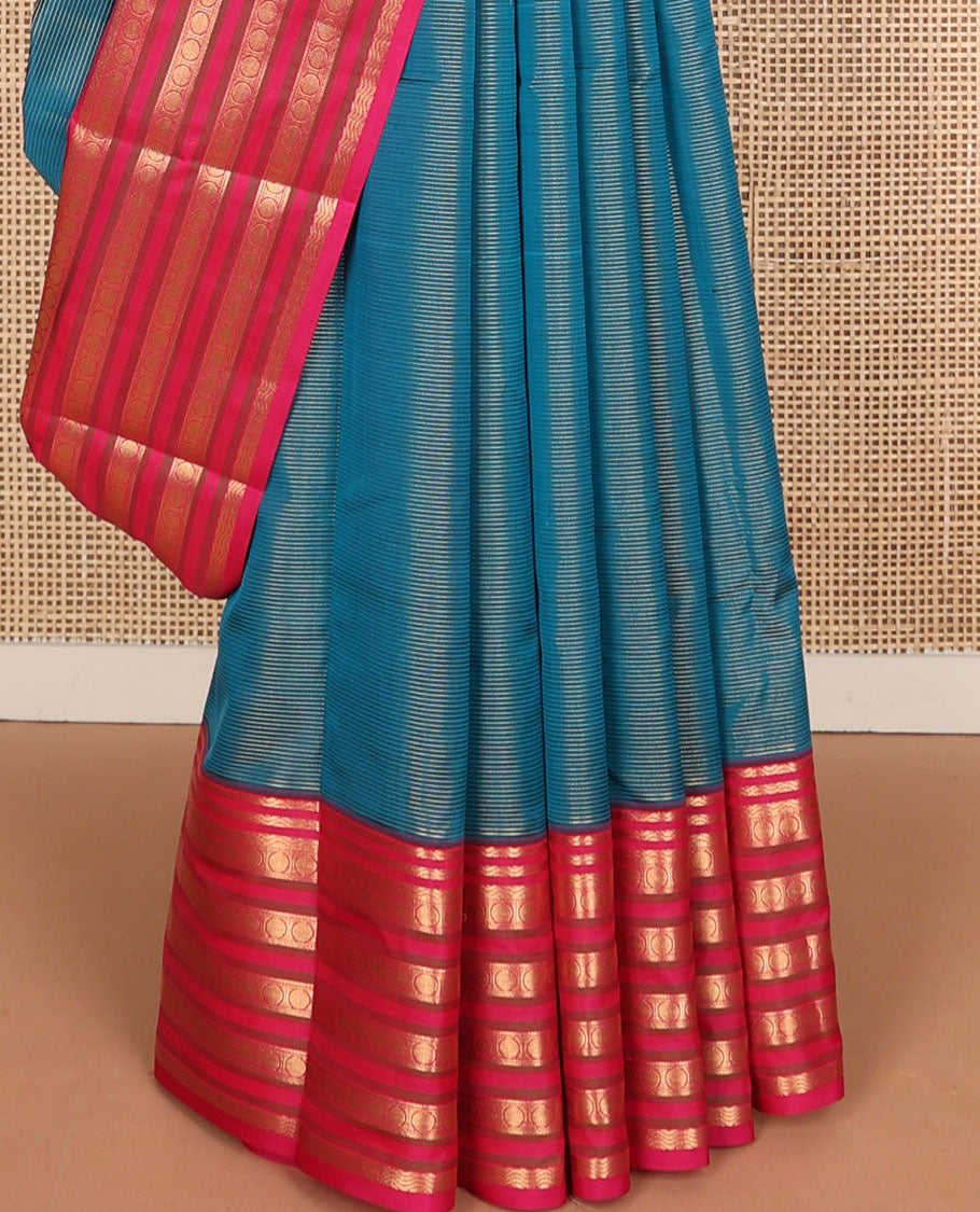 Blue striped vasundhara elite silk saree with contrast zari design border & floral jaal design pallu