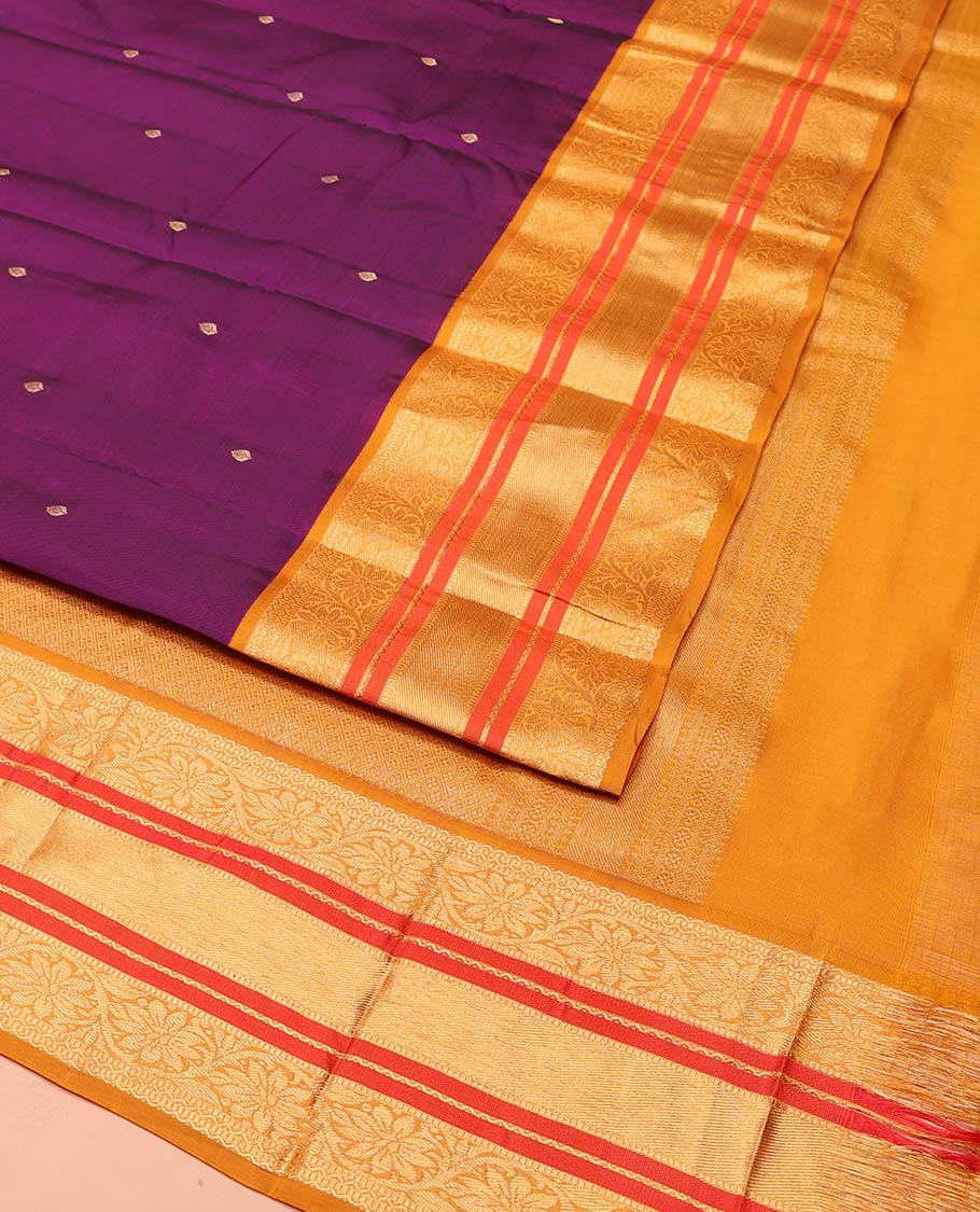 Purple Vasundhara Lite-Silk Mix Saree Decked Up with Zari Buttas on Its Body, Complemented by a Contrast Border of Neli, Muthu, and Kodi Visiry Designs, Pallu Spotlighted with Jaal Designs, and Paired with a Contrast Blouse